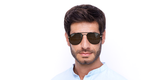 Lunettes de soleil homme GG0514S noir/dorée - Vue de face